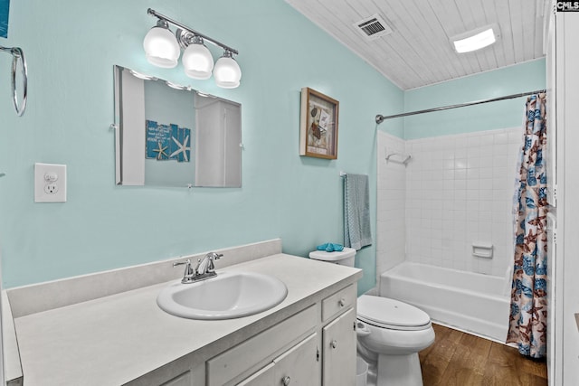 319 Graham St, West Columbia, SC 29169 - bathroom with wood finished floors, vanity, toilet, and shower / bath combo with shower curtain