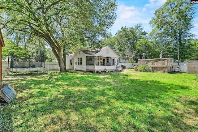 319 Graham St, West Columbia, SC 29169 - view of yard with a trampoline and a sunroom