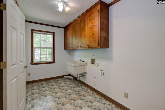 589 White Pines Cir, Camden, SC 29020 - laundry room with baseboards, cabinet space, washer hookup, a ceiling fan, and a textured ceiling