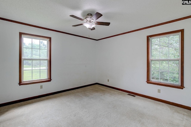 589 White Pines Cir, Camden, SC 29020 - unfurnished room with healthy amount of natural light, light carpet, baseboards, a ceiling fan, and ornamental molding