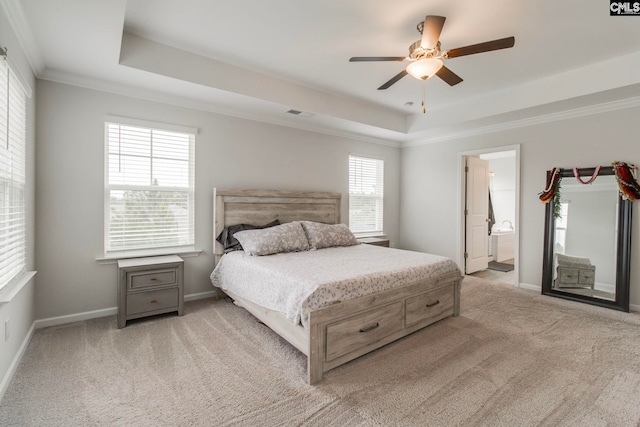 137 Brockway Dr, Columbia, SC 29229 - carpeted bedroom with a raised ceiling, ornamental molding, baseboards, ensuite bath, and a ceiling fan