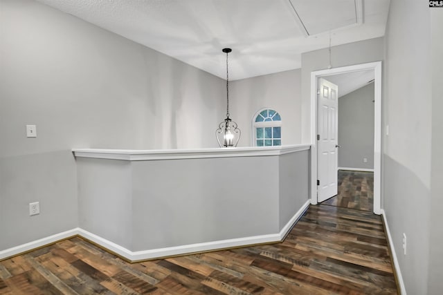 140 Otago Way W, Columbia, SC 29170 - hallway with attic access, dark wood finished floors, and baseboards