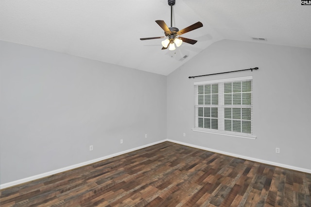 140 Otago Way W, Columbia, SC 29170 - spare room featuring a ceiling fan, vaulted ceiling, dark wood finished floors, and baseboards