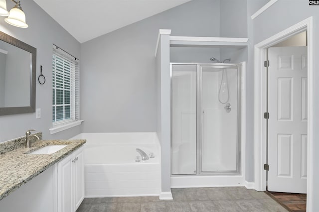 140 Otago Way W, Columbia, SC 29170 - bathroom with lofted ceiling, a shower stall, vanity, and a bath