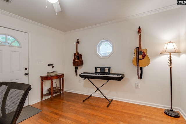 2241 Atascadero Dr, Columbia, SC 29206 - entrance foyer with wood finished floors, plenty of natural light, ornamental molding, and baseboards