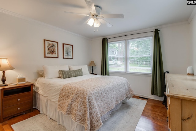 2241 Atascadero Dr, Columbia, SC 29206 - bedroom featuring light wood-style floors, crown molding, and ceiling fan