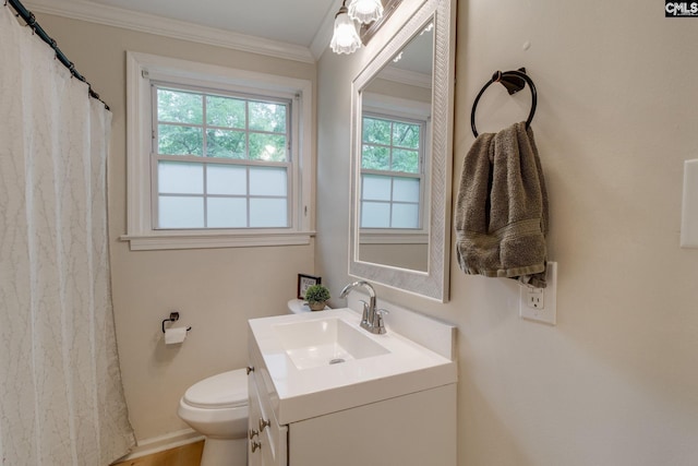 2241 Atascadero Dr, Columbia, SC 29206 - full bathroom with vanity, toilet, plenty of natural light, crown molding, and wood finished floors