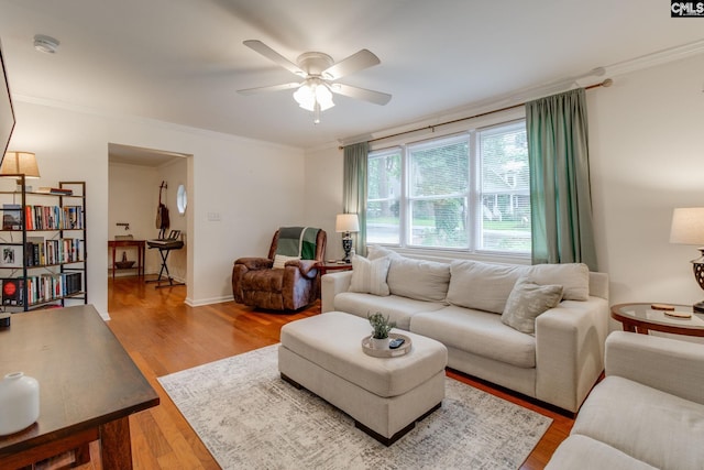 2241 Atascadero Dr, Columbia, SC 29206 - living room with ceiling fan, crown molding, and wood finished floors