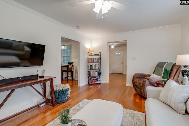 2241 Atascadero Dr, Columbia, SC 29206 - living room with ceiling fan, wood finished floors, crown molding, and baseboards