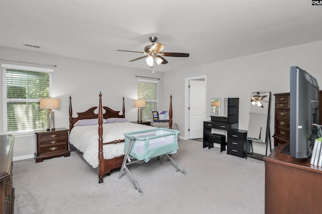 246 Harvest Glen Ln, West Columbia, SC 29169 - carpeted bedroom featuring multiple windows, baseboards, and a ceiling fan