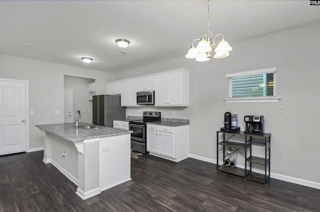 246 Harvest Glen Ln, West Columbia, SC 29169 - kitchen featuring appliances with stainless steel finishes, dark wood-style floors, and baseboards