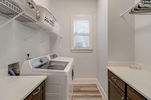 233 Pointe Overlook Dr, Chapin, SC 29036 - laundry room with washing machine and clothes dryer, light wood finished floors, and baseboards