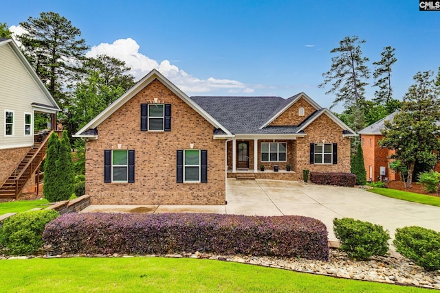 233 Pointe Overlook Dr, Chapin, SC 29036 - view of front of home with brick siding and roof with shingles