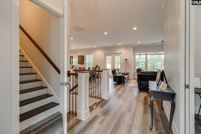 233 Pointe Overlook Dr, Chapin, SC 29036 - staircase with wood finished floors, french doors, recessed lighting, crown molding, and baseboards