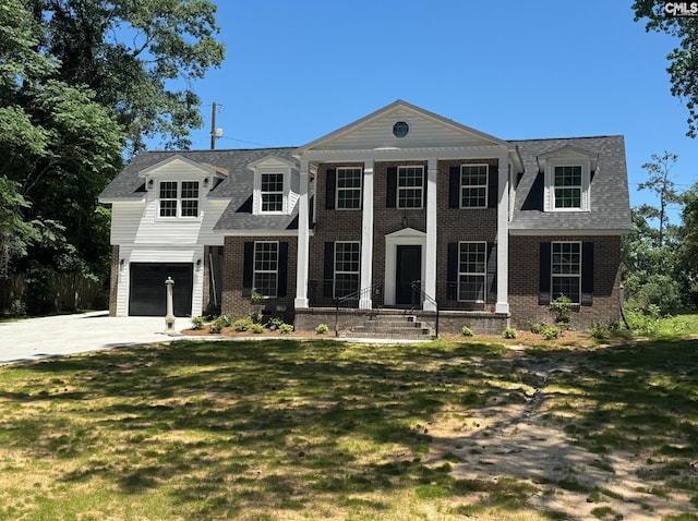 208 Juarez Ct, Columbia, SC 29206 - view of front facade featuring brick siding, an attached garage, driveway, a front lawn, and roof with shingles