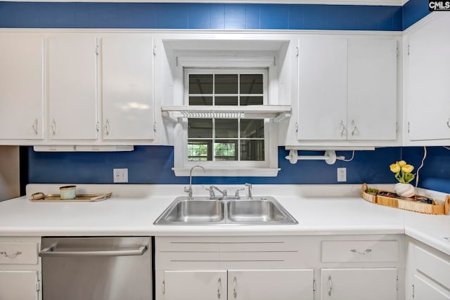 1818 Stratford Rd, Cayce, SC 29033 - kitchen with stainless steel dishwasher, a sink, white cabinets, and light countertops