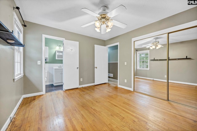 1818 Stratford Rd, Cayce, SC 29033 - unfurnished bedroom featuring light wood finished floors, baseboards, a closet, and a sink