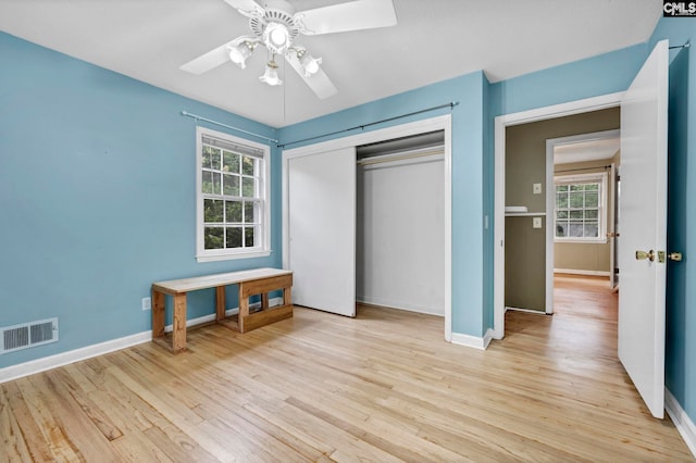 1818 Stratford Rd, Cayce, SC 29033 - unfurnished bedroom featuring baseboards, light wood-style flooring, and multiple windows