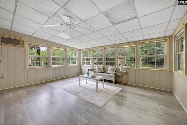 1818 Stratford Rd, Cayce, SC 29033 - sunroom / solarium featuring wood finished floors, plenty of natural light, wood walls, an AC wall unit, and a wooden deck