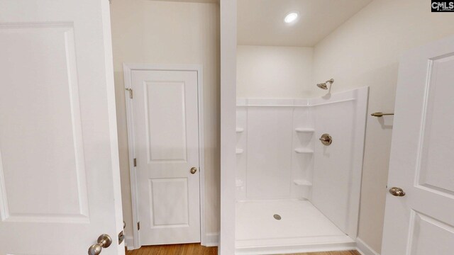 225 Trotter Ln, Orangeburg, SC 29118 - full bathroom with a shower and wood finished floors