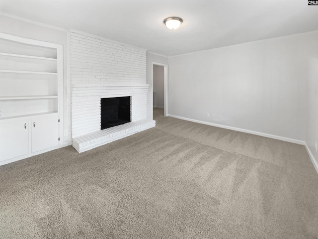 1920 Pennfield Dr, Columbia, SC 29223 - unfurnished living room featuring carpet floors, a brick fireplace, baseboards, and built in features