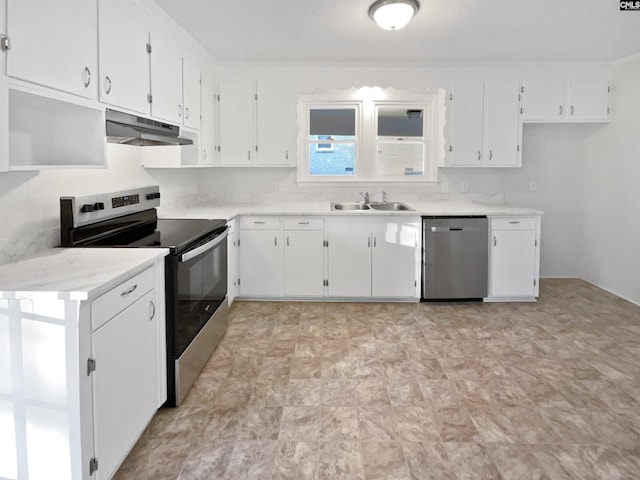 1920 Pennfield Dr, Columbia, SC 29223 - kitchen featuring appliances with stainless steel finishes, under cabinet range hood, white cabinetry, light countertops, and a sink