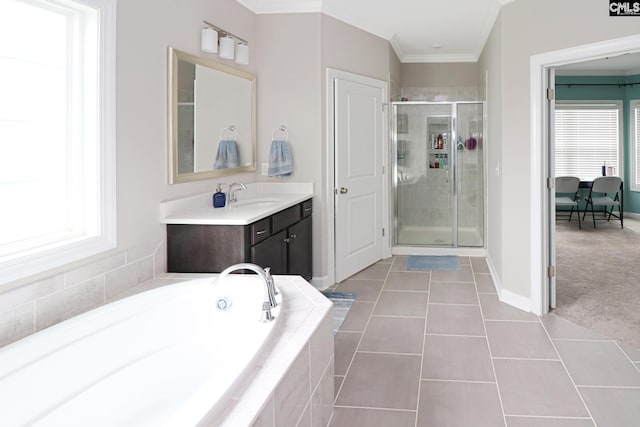 138 Long Cove Dr, Blythewood, SC 29016 - full bath featuring vanity, a shower stall, a bath, tile patterned floors, and ornamental molding