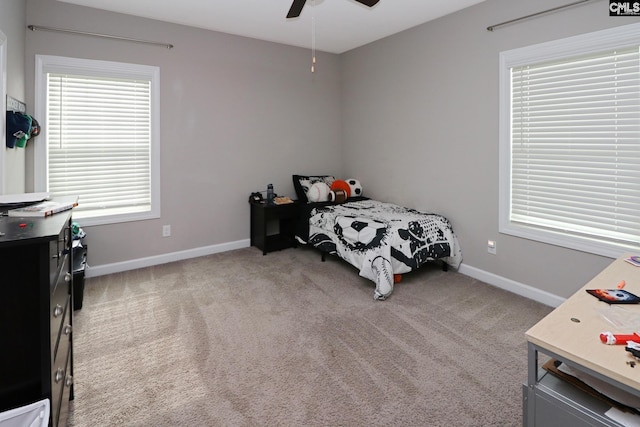 138 Long Cove Dr, Blythewood, SC 29016 - bedroom featuring baseboards, light carpet, and a ceiling fan