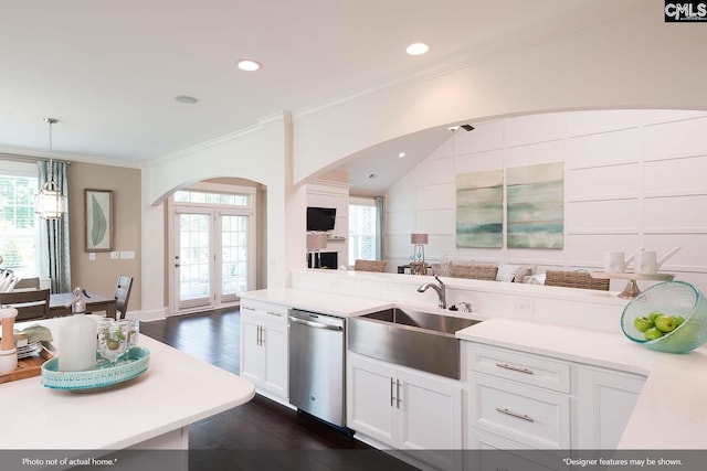 2348 Hadley Xing, Chapin, SC 29036 - kitchen featuring stainless steel dishwasher, a sink, arched walkways, open floor plan, and white cabinetry