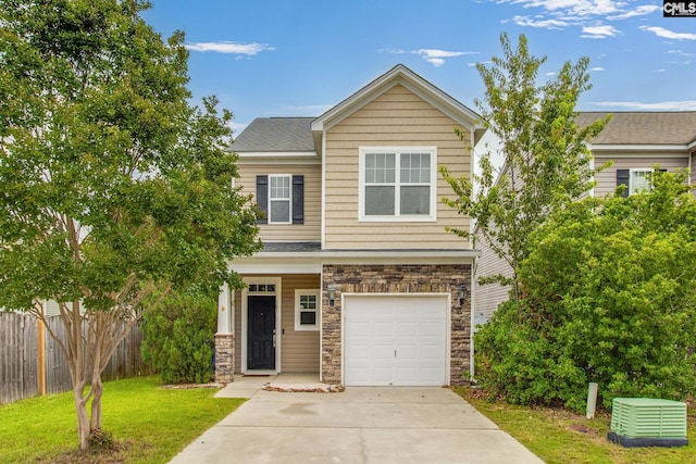 301 Chestnut Oak Ct, West Columbia, SC 29169 - view of front facade with stone siding, an attached garage, and concrete driveway