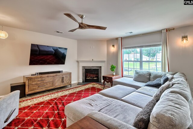 2121 Connor Way, Newberry, SC 29108 - living area with ceiling fan and a glass covered fireplace