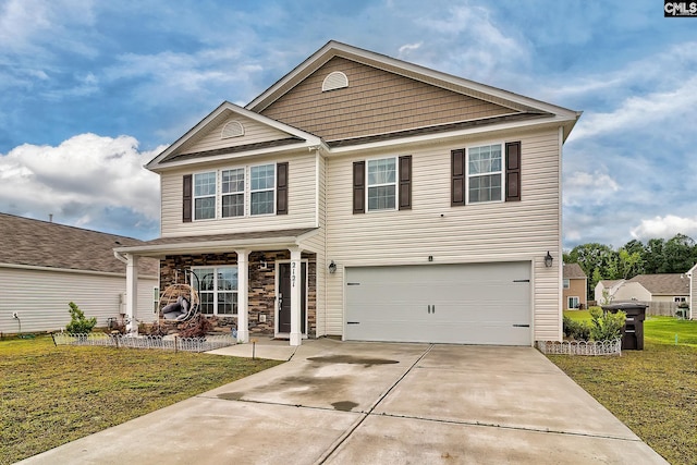 2121 Connor Way, Newberry, SC 29108 - traditional home featuring concrete driveway, a garage, a front yard, a porch, and stone siding