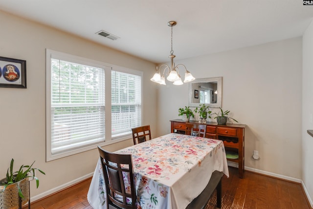 1123 Triple Crown Ct, Elgin, SC 29045 - dining space with plenty of natural light, a chandelier, baseboards, and wood finished floors