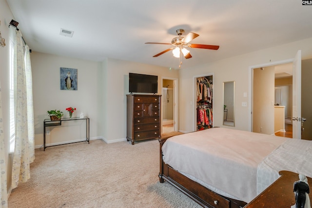 1123 Triple Crown Ct, Elgin, SC 29045 - bedroom with carpet flooring, a walk in closet, a closet, ceiling fan, and connected bathroom
