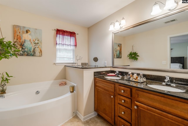 1123 Triple Crown Ct, Elgin, SC 29045 - ensuite bathroom featuring double vanity, a garden tub, and tile patterned flooring