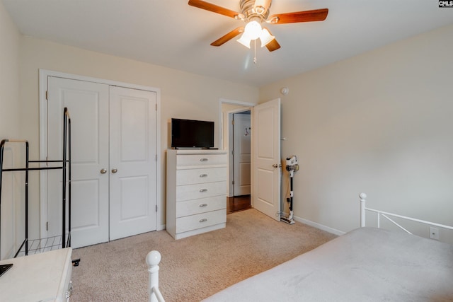 1123 Triple Crown Ct, Elgin, SC 29045 - bedroom featuring light colored carpet, a closet, baseboards, and ceiling fan