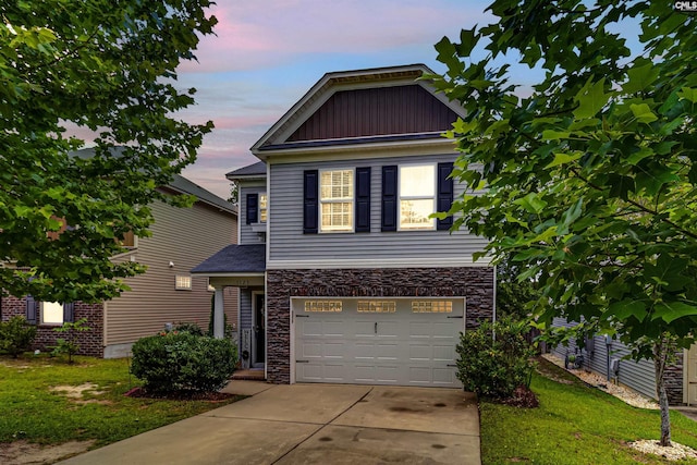 1123 Triple Crown Ct, Elgin, SC 29045 - view of front of property featuring stone siding, a garage, driveway, and board and batten siding