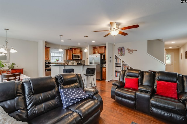 1123 Triple Crown Ct, Elgin, SC 29045 - living area with a chandelier, dark wood-type flooring, a ceiling fan, and recessed lighting