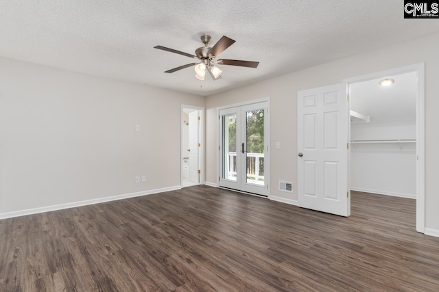 2308 Exton Shore Dr, Columbia, SC 29209 - unfurnished room with ceiling fan, dark wood-style flooring, baseboards, and a textured ceiling