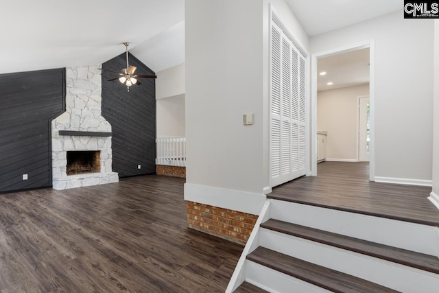 2308 Exton Shore Dr, Columbia, SC 29209 - stairway featuring wood finished floors, ceiling fan, baseboards, lofted ceiling, and a fireplace
