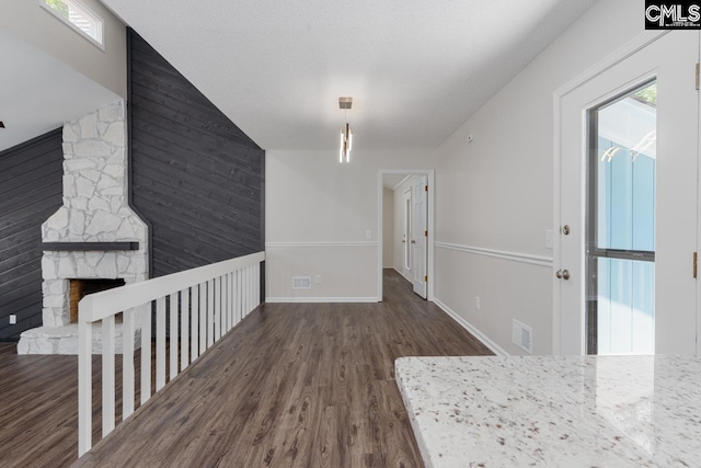 2308 Exton Shore Dr, Columbia, SC 29209 - corridor with wood finished floors, vaulted ceiling, plenty of natural light, and baseboards