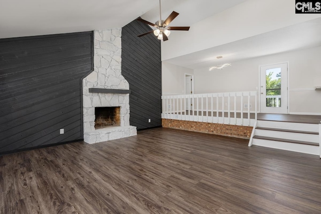 2308 Exton Shore Dr, Columbia, SC 29209 - unfurnished living room featuring a ceiling fan, wood finished floors, a fireplace, and high vaulted ceiling