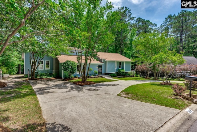 2308 Exton Shore Dr, Columbia, SC 29209 - view of front facade with concrete driveway and a front lawn