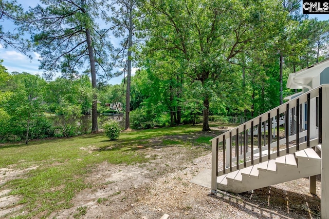 2308 Exton Shore Dr, Columbia, SC 29209 - view of yard with view of wooded area and stairway