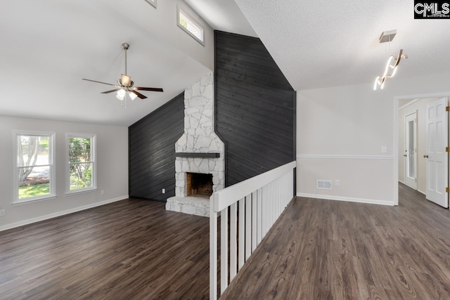 2308 Exton Shore Dr, Columbia, SC 29209 - unfurnished living room with ceiling fan, wood finished floors, high vaulted ceiling, baseboards, and a fireplace