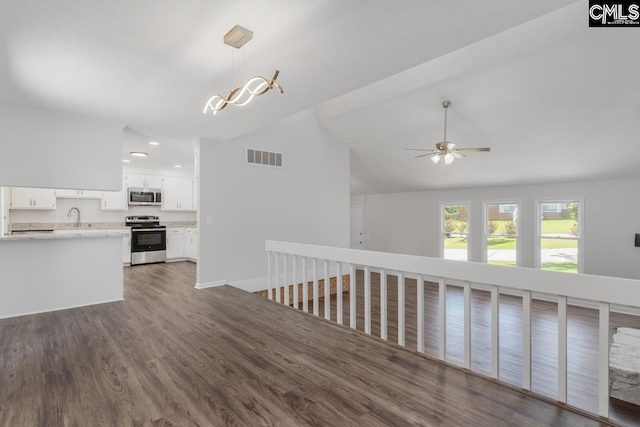 2308 Exton Shore Dr, Columbia, SC 29209 - unfurnished living room featuring a sink, lofted ceiling, ceiling fan, dark wood-type flooring, and recessed lighting