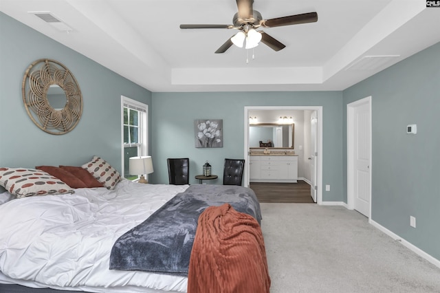 53 Findlay Cir, Elgin, SC 29045 - bedroom with a raised ceiling, carpet, baseboards, and ensuite bath