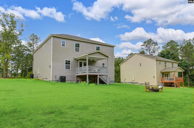 53 Findlay Cir, Elgin, SC 29045 - back of property featuring a deck, a yard, and central AC unit
