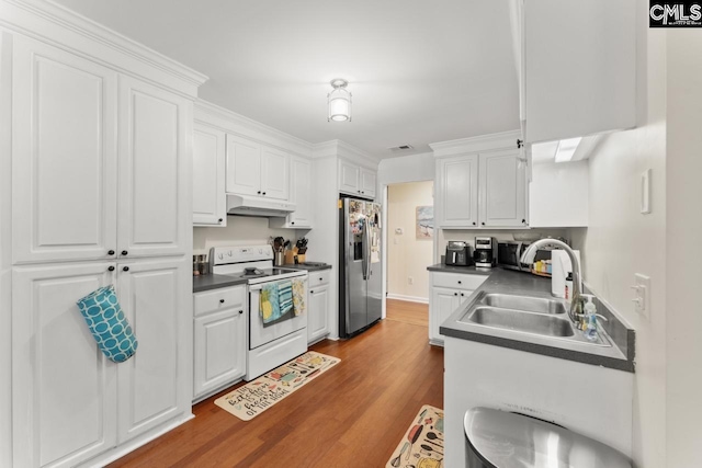 612 Williams Cir, West Columbia, SC 29172 - kitchen featuring appliances with stainless steel finishes, under cabinet range hood, a sink, and dark countertops