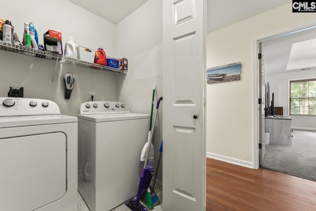 612 Williams Cir, West Columbia, SC 29172 - washroom featuring washing machine and dryer, wood finished floors, and baseboards